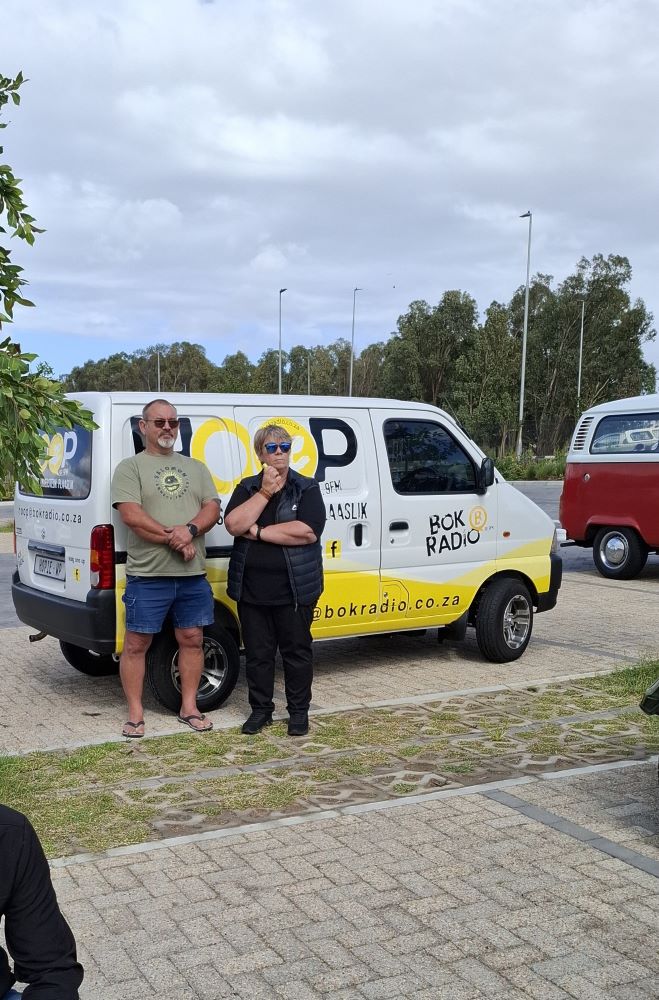Wilinda Ford from Bok Radio's HOOP project and her partner standing by their charity van during the Wild Buggers pre-trip briefing.