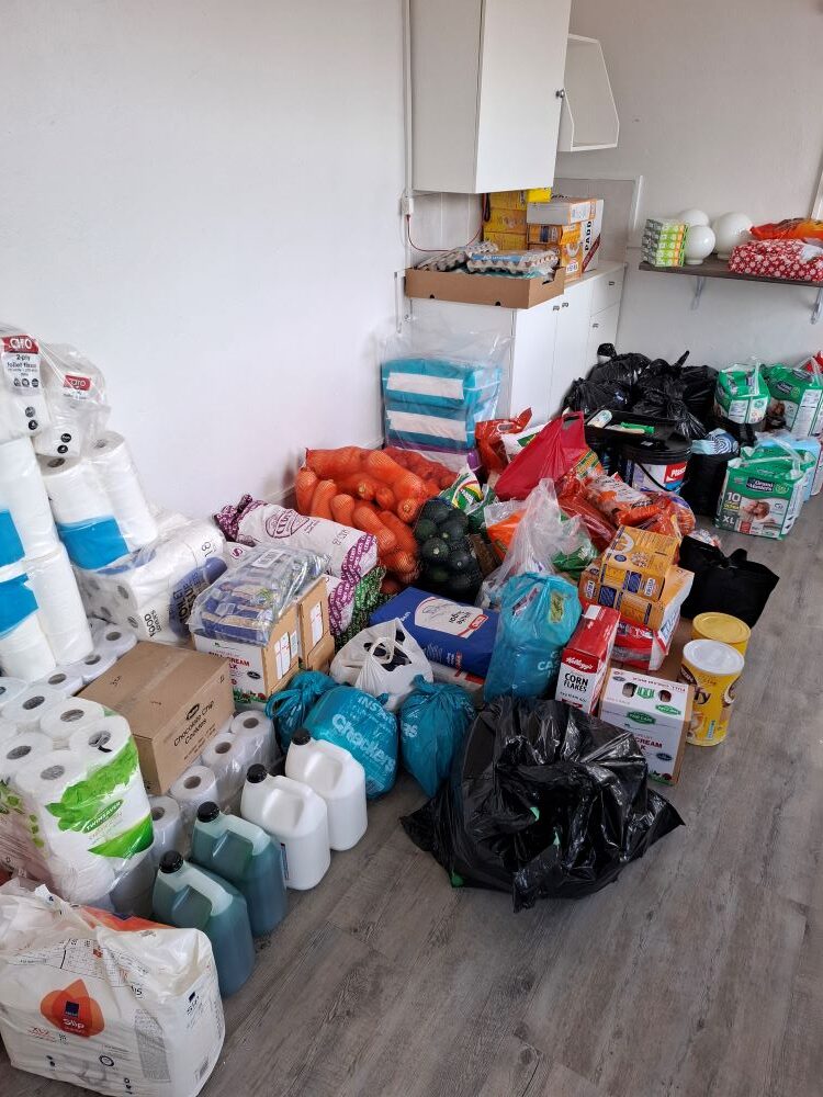 Bulk donations including toiletries, non-perishable food, and cleaning supplies delivered by the Wild Buggers Beach Buggy Club to Badisa Goue Aar.
