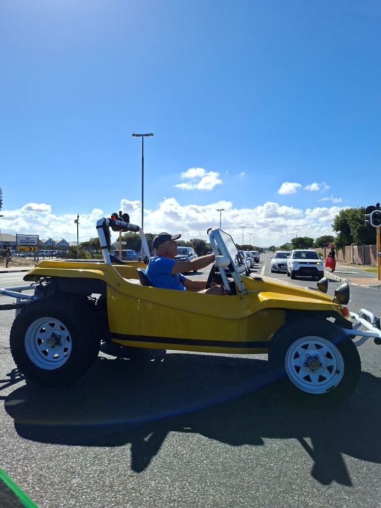 Wiehann driving his yellow 1600 VW air-cooled Beamish beach buggy named Bugg during a Wild Buggers club run in Cape Town.