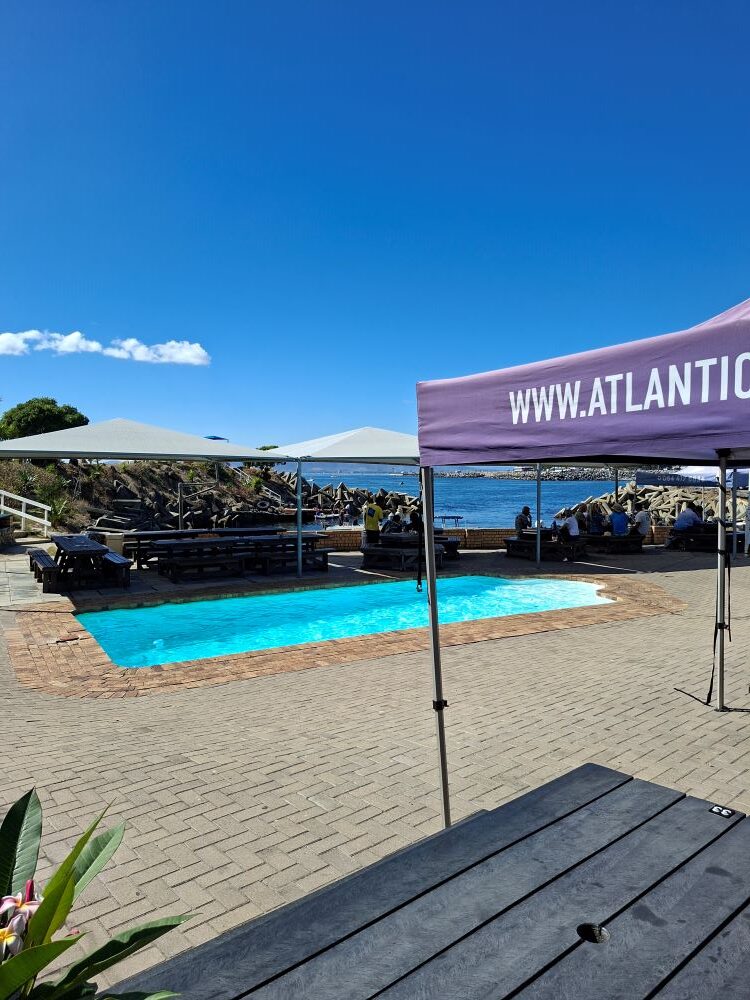 A view of the sparkling swimming pool and the Atlantic Ocean backdrop at the Oceana Power Boat Club during a Wild Buggers Beach Buggy Club event.