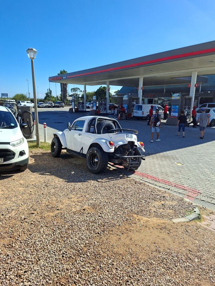 Andre and Karen Welsh’s white VW Baja Bug bakkie with a 1600 air-cooled motor parked at Ou Meul in Melkbosstrand.