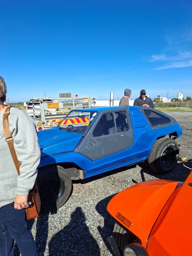 Rhoodie’s blue Kango beach buggy parked at a West Coast pitstop during the Wild Buggers West Coast cultural experience Run, showing off classic VW beach buggy style on the scenic club route.