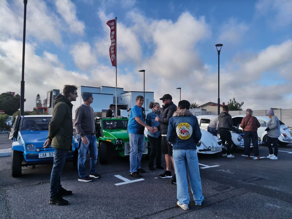 Wild Buggers members arriving at the Bothasig meeting point for the West Coast cultural experience Run, greeting each other before the Beach Buggy Club convoy heads out from Cape Town.