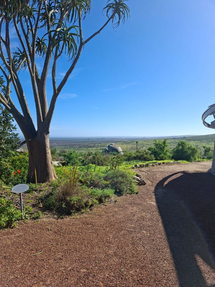 Scenic West Coast views outside !Khwa ttu during the Wild Buggers West Coast cultural experience Run, showing the natural surroundings and open landscape around the San Heritage Centre.