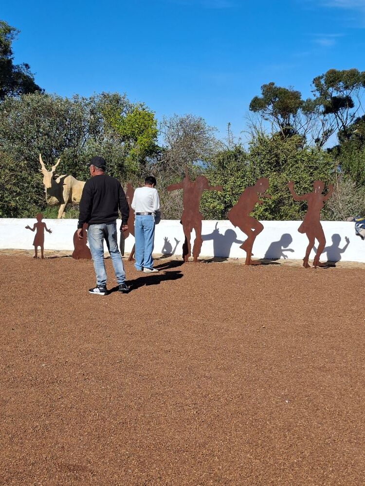 Faizal and Ayesha looking at sculptures at !Khwa ttu during the Wild Buggers West Coast cultural experience Run, enjoying one of the artistic displays at the San Heritage Centre on the West Coast.