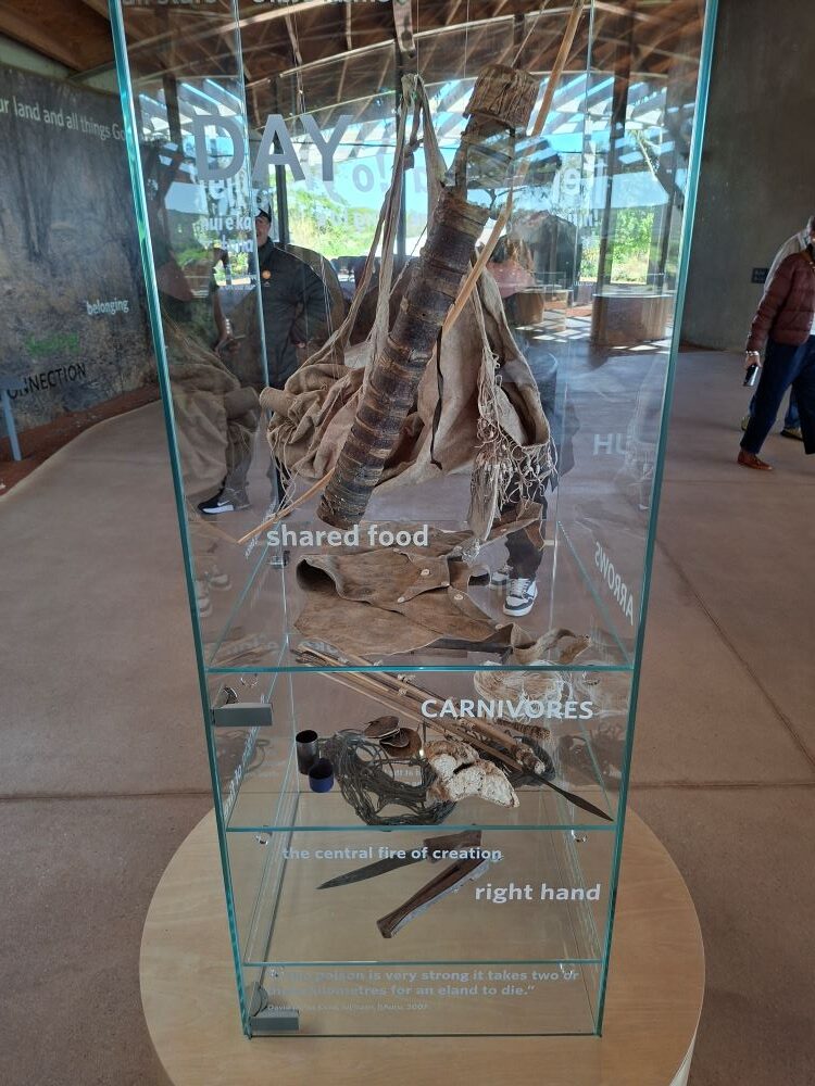Display cabinets at !Khwa ttu showing various tools, objects, and everyday items used by San people during the Wild Buggers West Coast cultural experience Run, highlighting part of the historical exhibits at the San Heritage Centre.