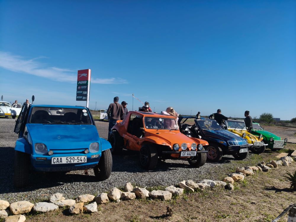 A lineup of Wild Buggers beach buggies at a West Coast pitstop, including Rhoodie and Yolande Ackerman’s blue Kango with a 1600 VW Golf motor, plus Brent, Lerene, Wiehann and Anton’s buggies during the West Coast cultural experience Run.