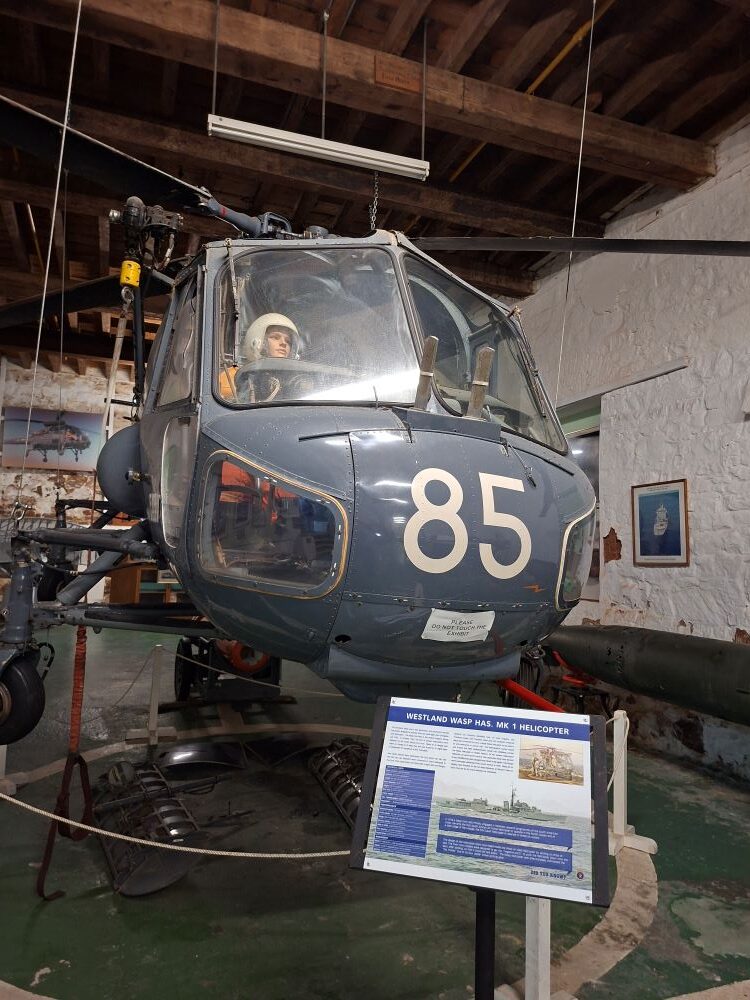 A Westland Wasp HAS Mk 1 helicopter on display inside the historic Mast House at the South African Naval Museum.