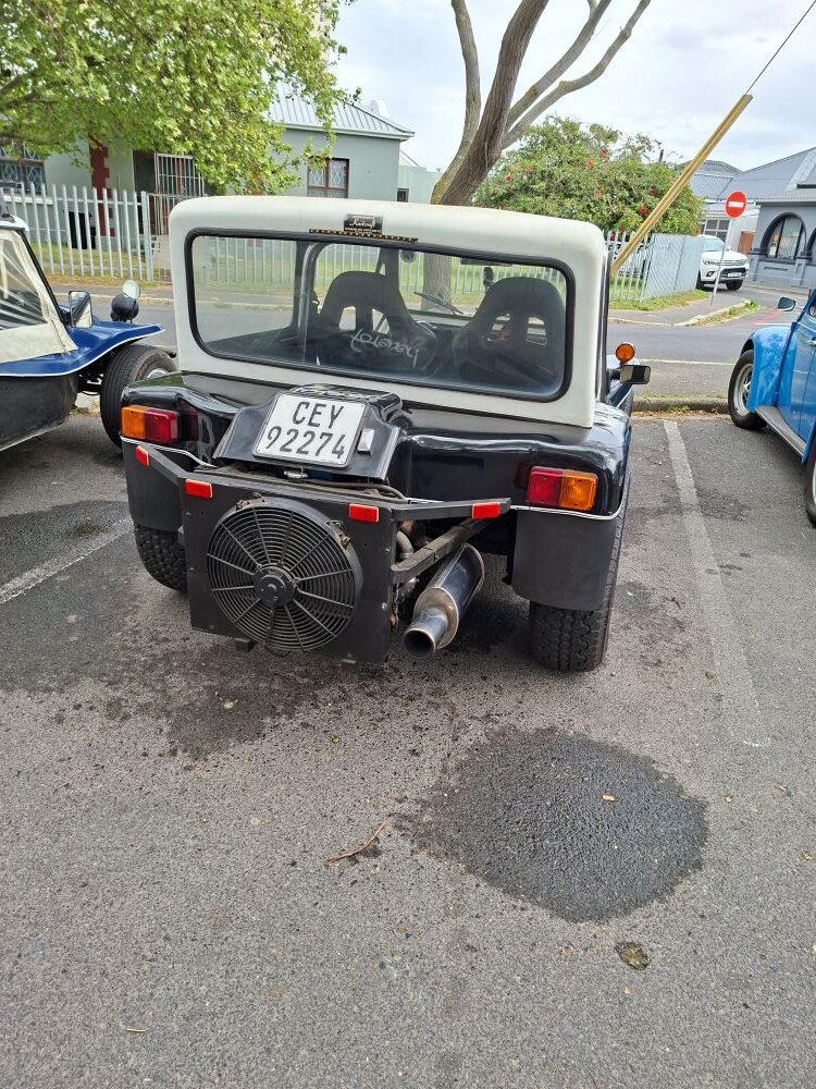 A Kestrel KartKraft beach buggy parked along the street during the club run.