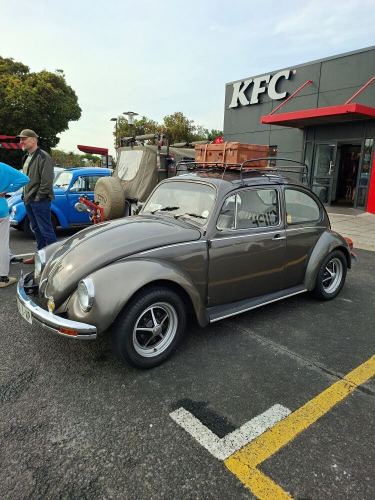 Viv Reyneke's metallic gunmetal grey classic air-cooled VW Beetle parked at the Bothasig meeting point.