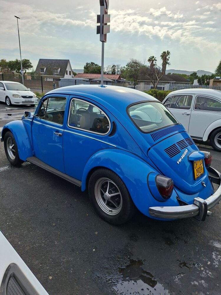 A bright blue old school Beetle parked at the Bothasig meeting point ahead of the club run.