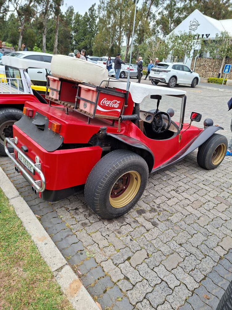 Hugo Koegelenberg's red Coca Cola T-bug parked at the Potbelly Coffee Shop stop during the club run.
