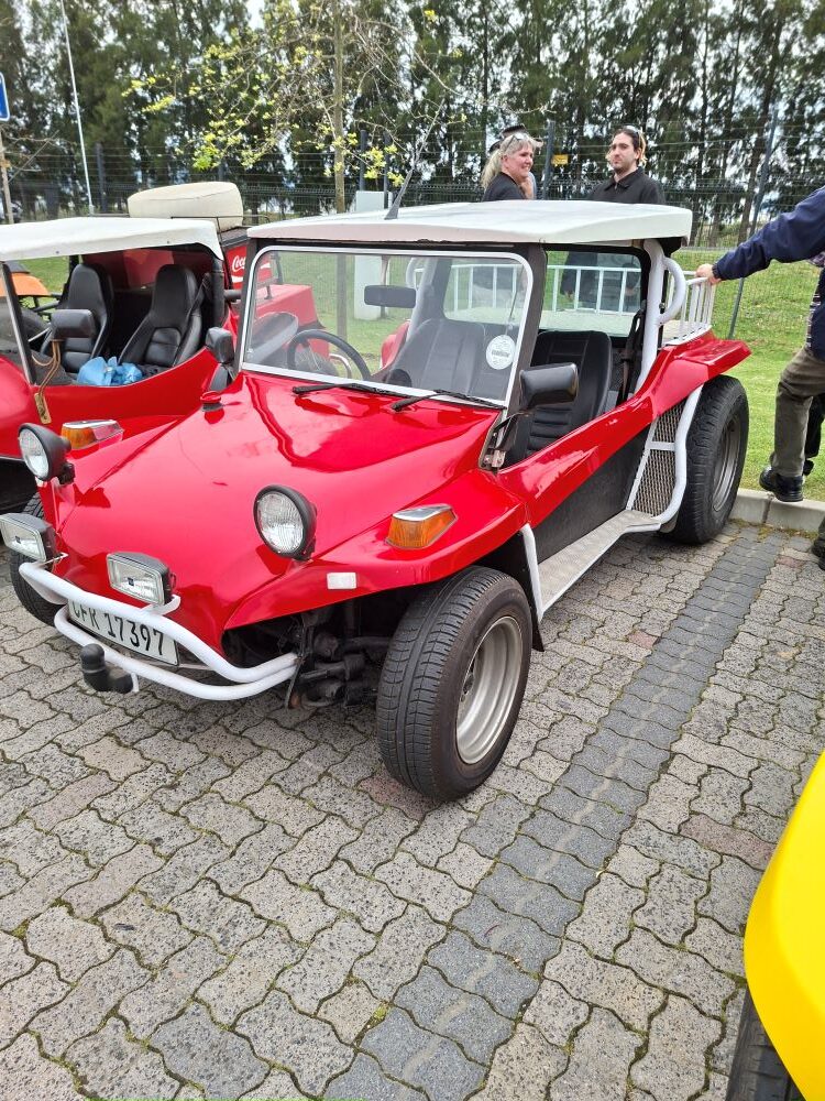 A gleaming red Beamish beach buggy parked during a club stop on Wiehann's Run