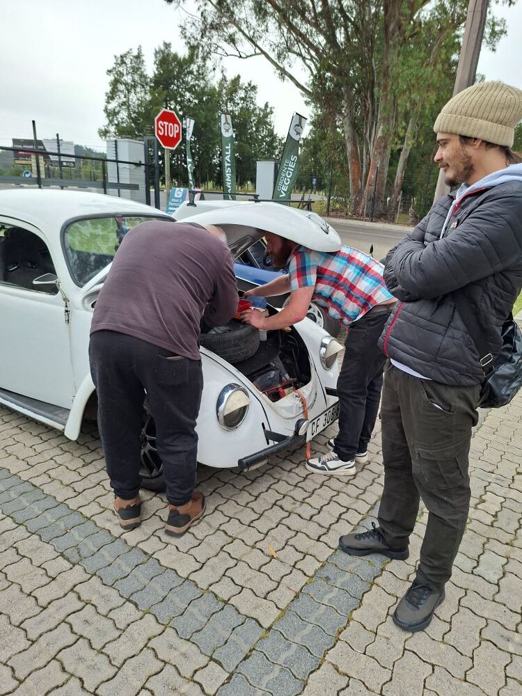 Leon and Bertus assisting with a roadside check during the pit stop at Potbelly Coffee Shop in Klapmuts.