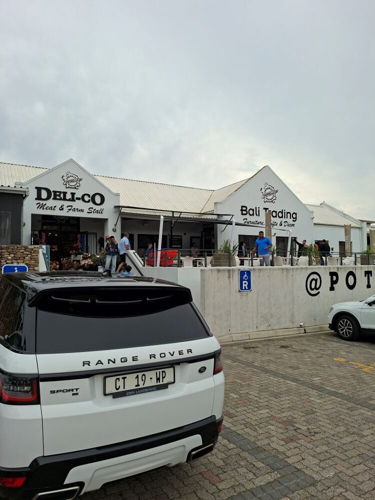 The storefront and exterior view of Potbelly Coffee Shop and Bakery in Klapmuts during a club stop.