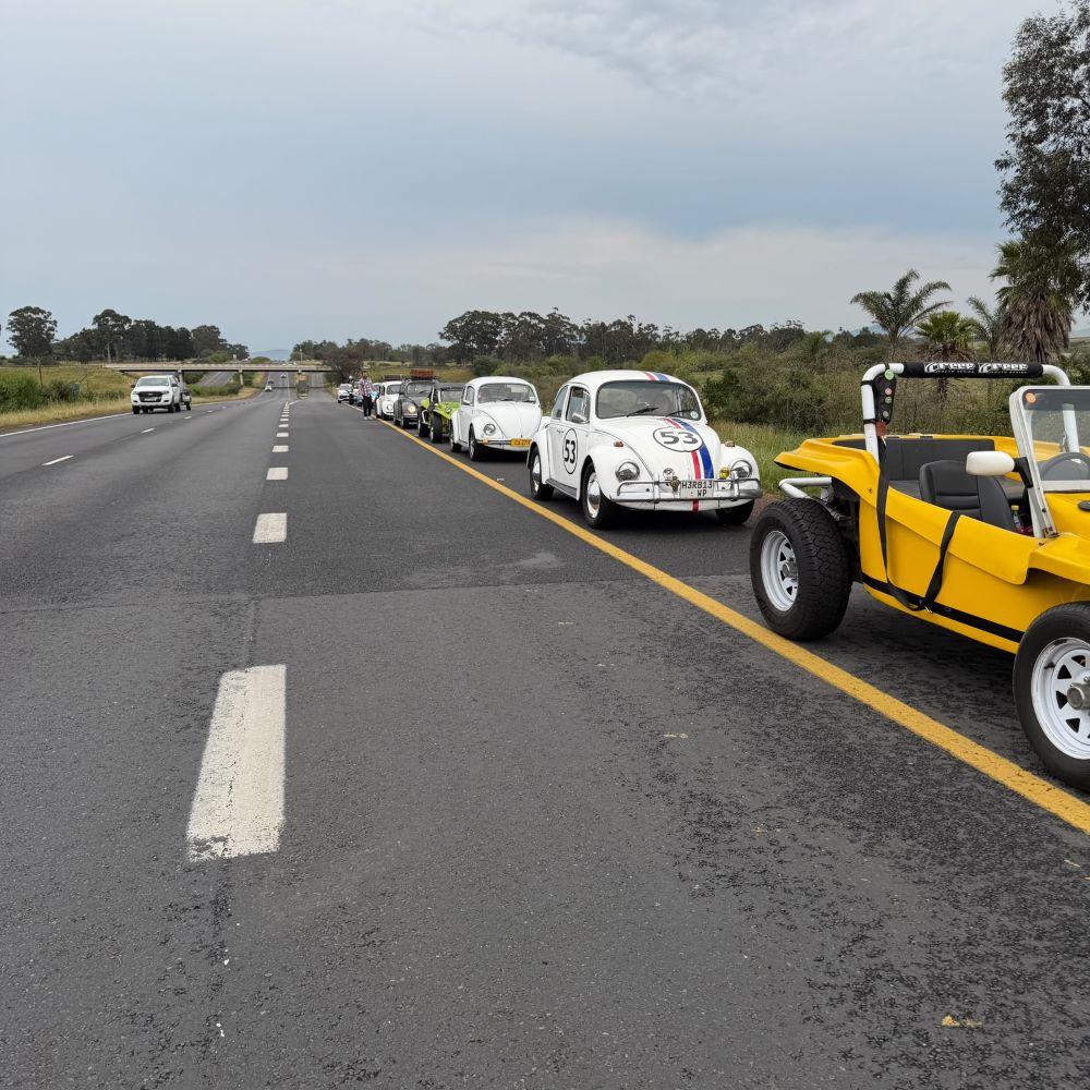 A convoy of classic air-cooled VWs and beach buggies pulled over on the side of the road for a regroup stop during the club drive.